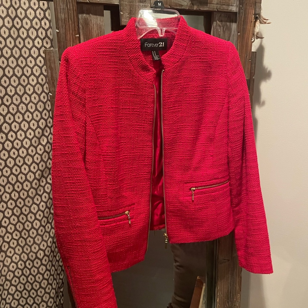 Red jacket zip up slightly used looks like new